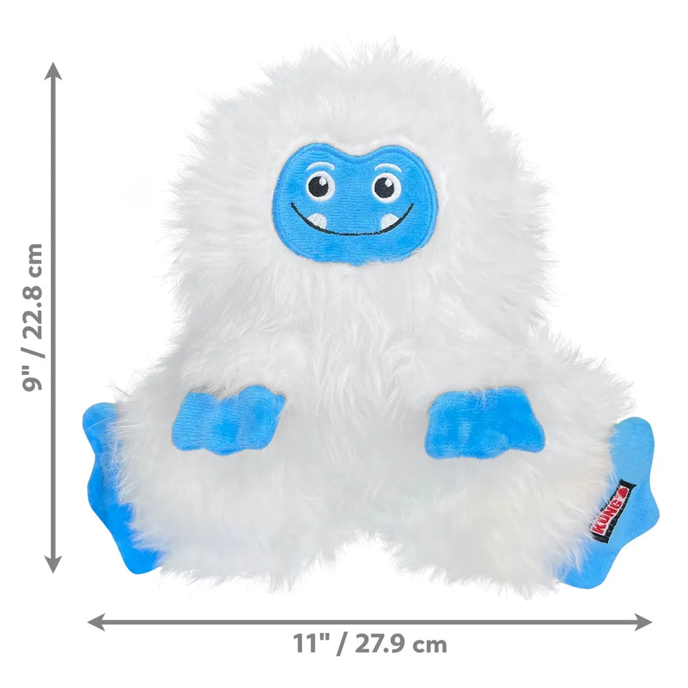 KONG Holiday Frizzles Yeti M/L – blød julebamse til hunde med piv og knitrelyd
